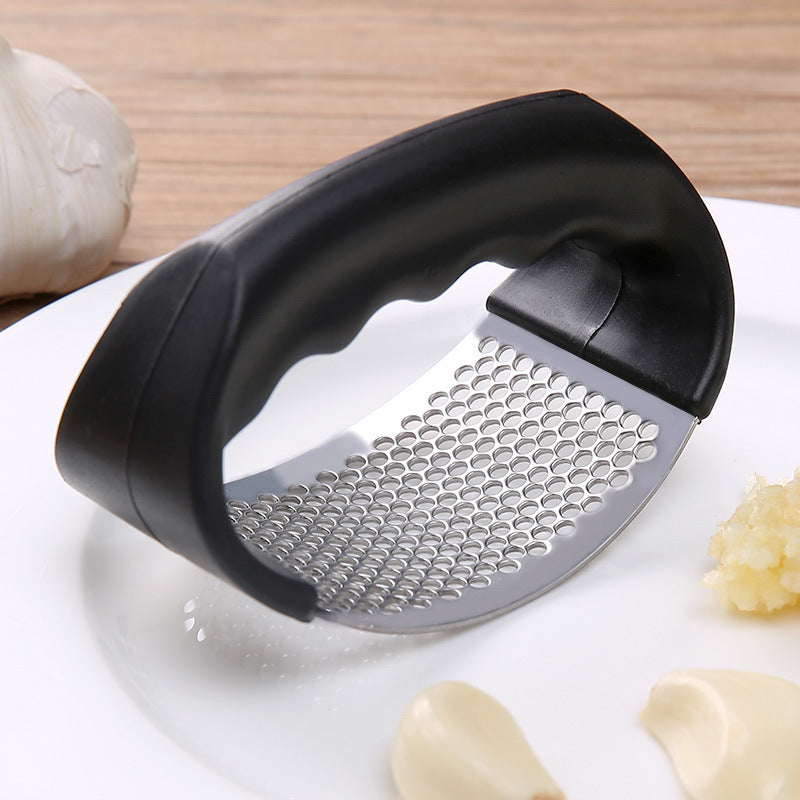 Explosive manual garlic press stainless steel mashed